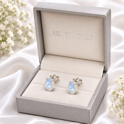 Oval white Moonstone ear studs in 925 Sterling Silver with four-prong setting