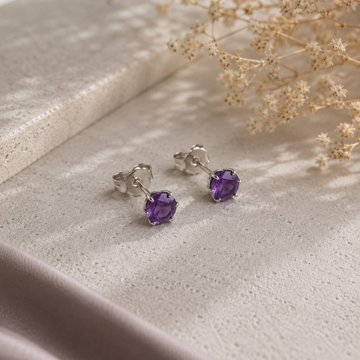 Round purple Amethyst ear studs in 925 Sterling Silver with six-prong setting