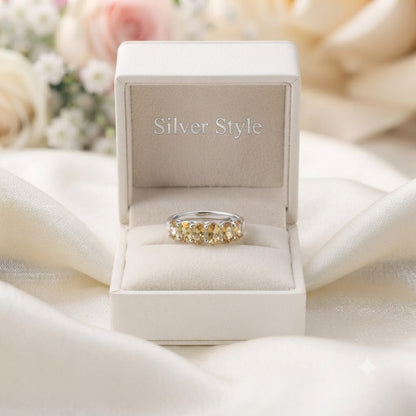 Band Citrine Ring crafted in 925 Sterling Silver featuring five oval cut Citrine gemstones.
