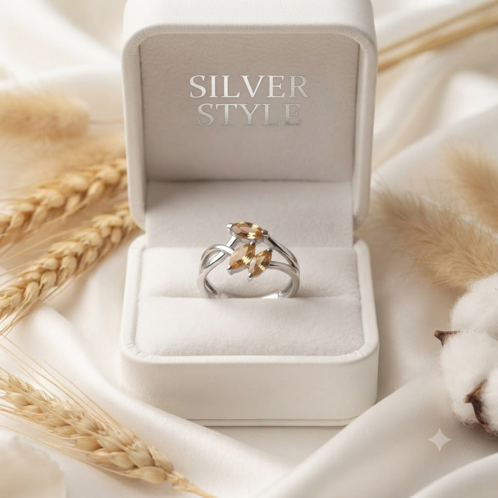 Triple Citrine Floral Ring crafted in 925 Sterling Silver with three yellow Citrine gemstones.