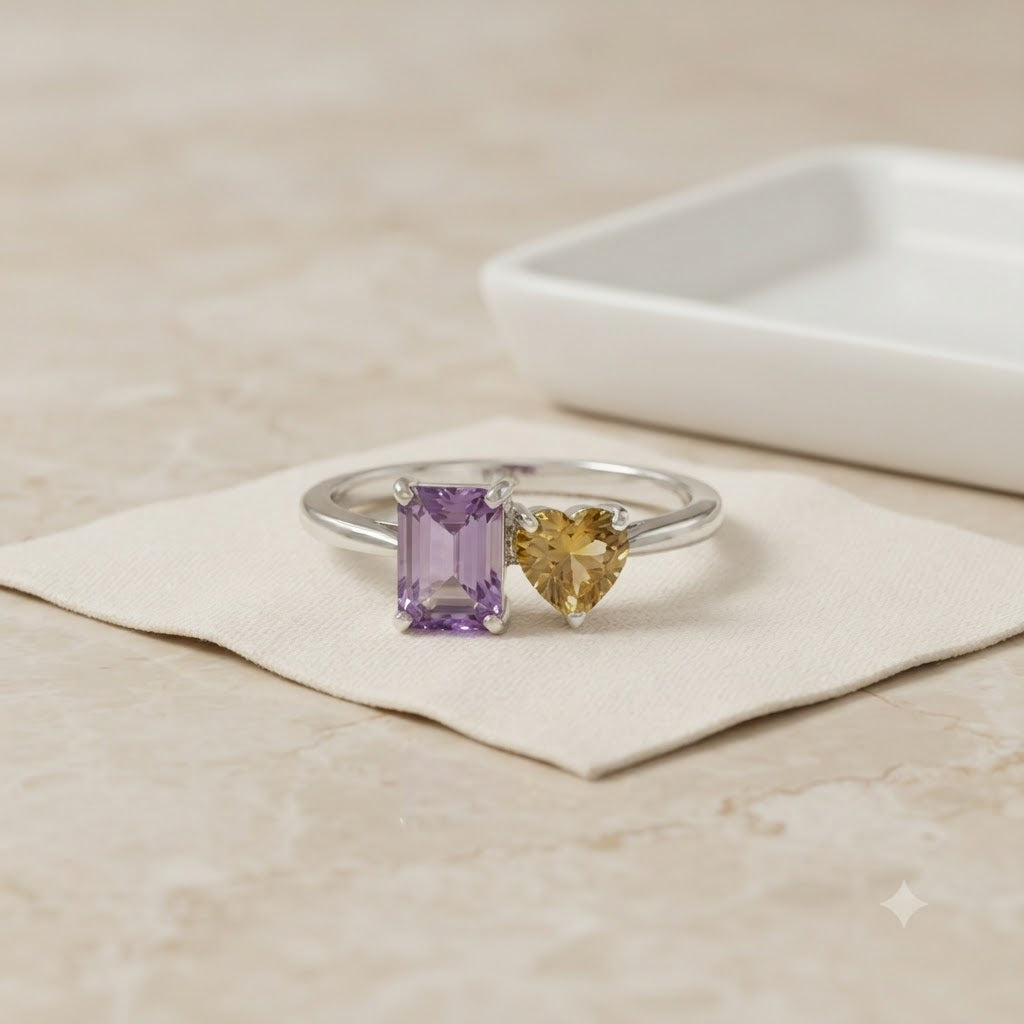 Twin Amethyst Ring in 925 Sterling Silver featuring an emerald cut purple Amethyst and a heart-shaped golden Citrine