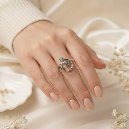 Triple Emerald Spiral Ring crafted in 925 Sterling Silver with three green Emerald gemstones
