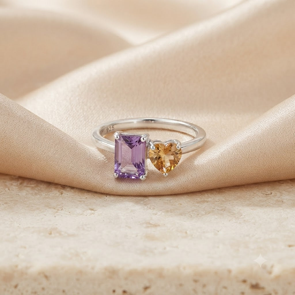 Twin Amethyst Ring in 925 Sterling Silver featuring an emerald cut purple Amethyst and a heart-shaped golden Citrine
