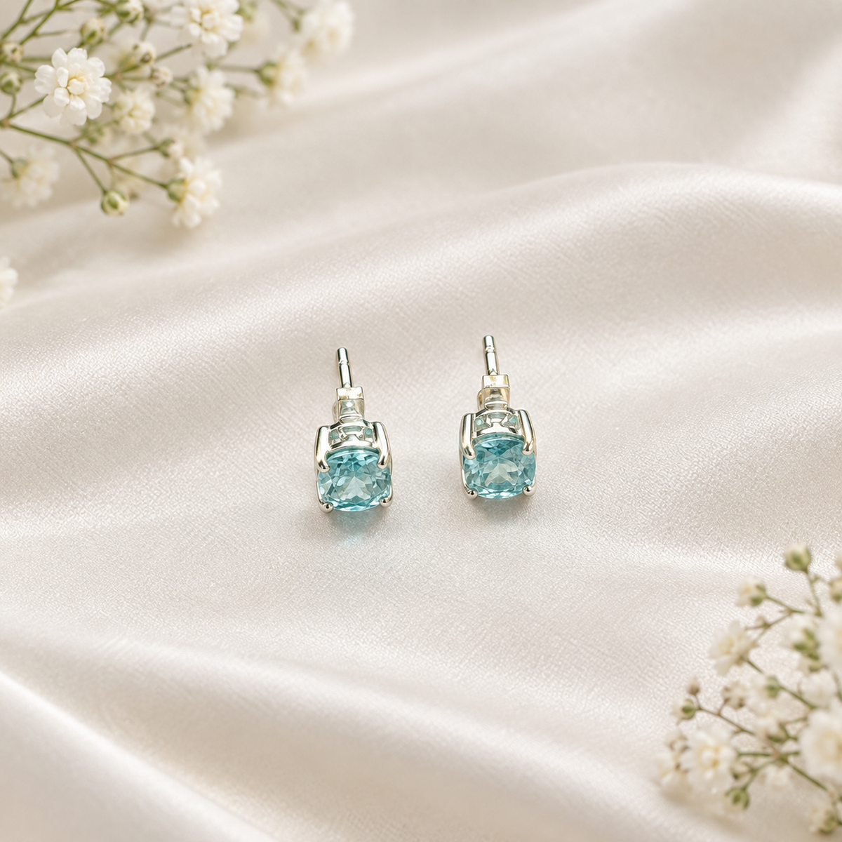 Blue Topaz stud earrings in 925 sterling silver with faceted blue gemstones