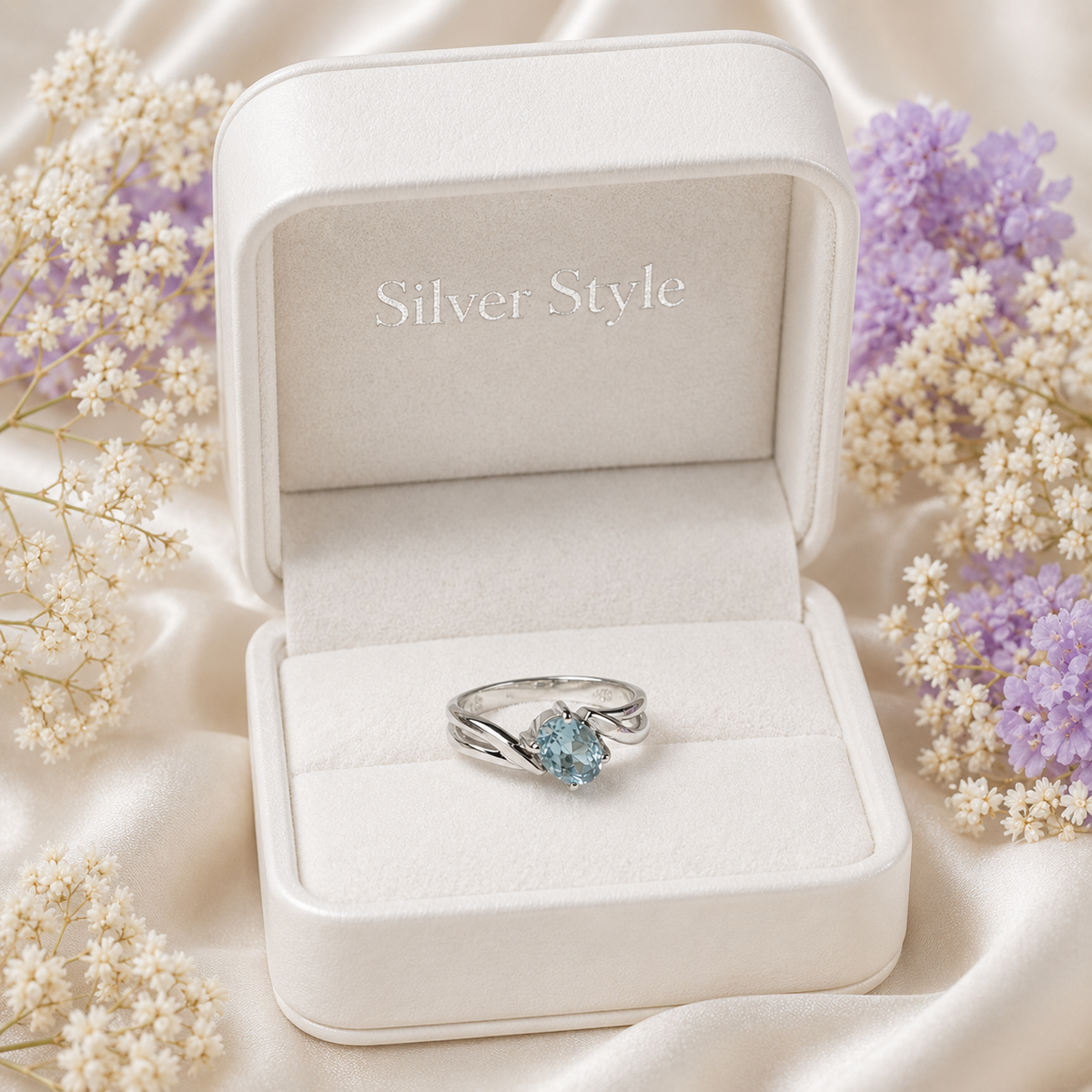 Oval Blue Topaz Ring crafted in 925 Sterling Silver with an oval cut sky blue gemstone in a four-prong setting and split shank design.