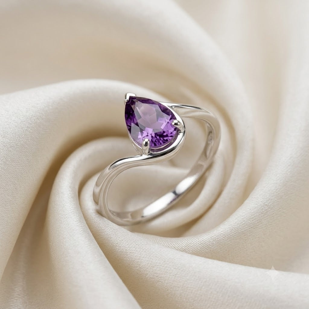 Pear Amethyst Ring in 925 Sterling Silver featuring a pear cut purple gemstone