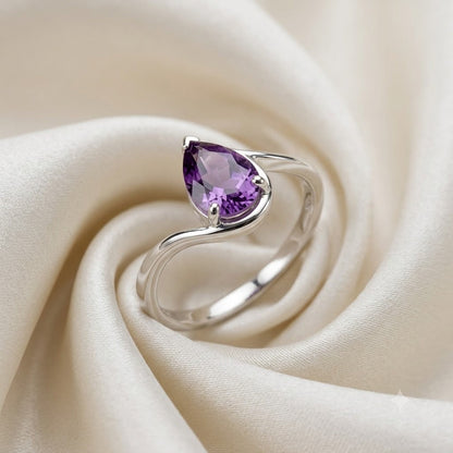 Pear Amethyst Ring in 925 Sterling Silver featuring a pear cut purple gemstone