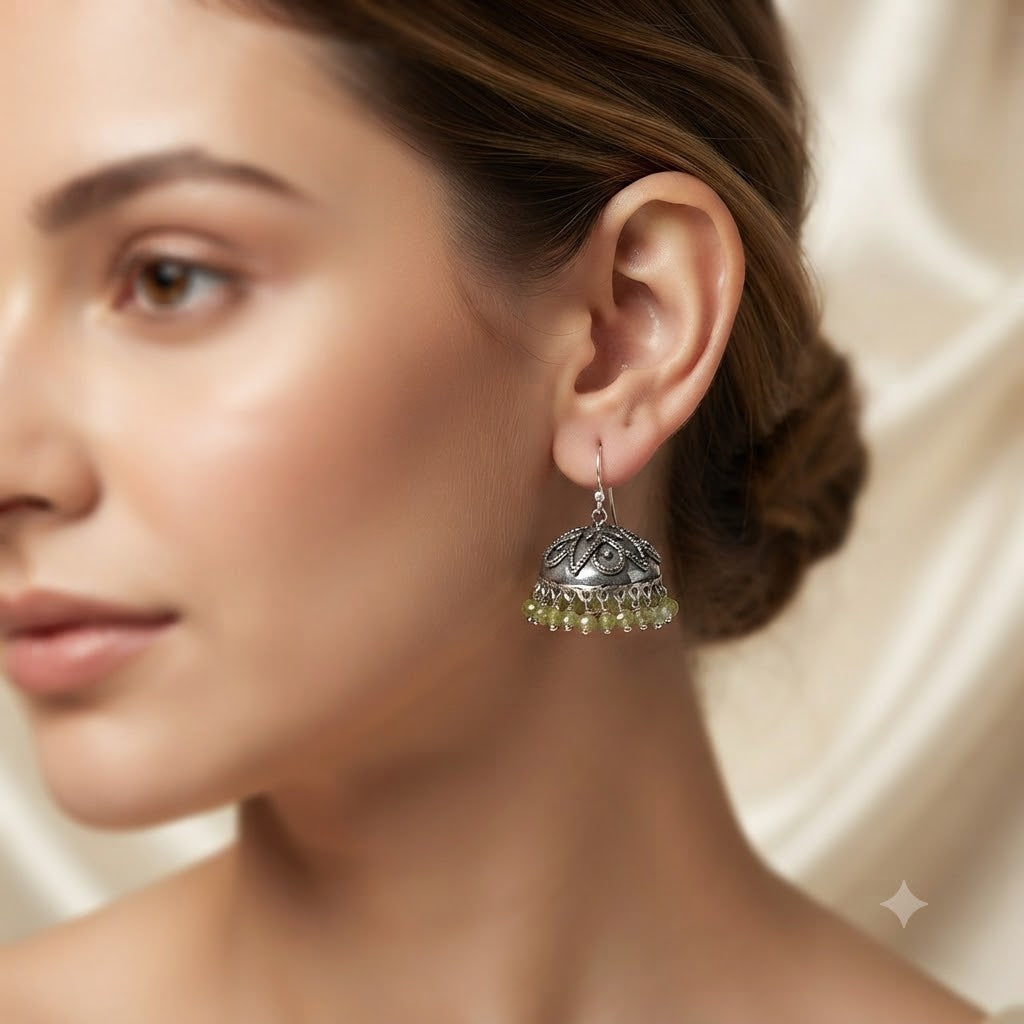 	Oxidised Peridot jhumka earrings with green gemstone bead drops in 925 Sterling Silver