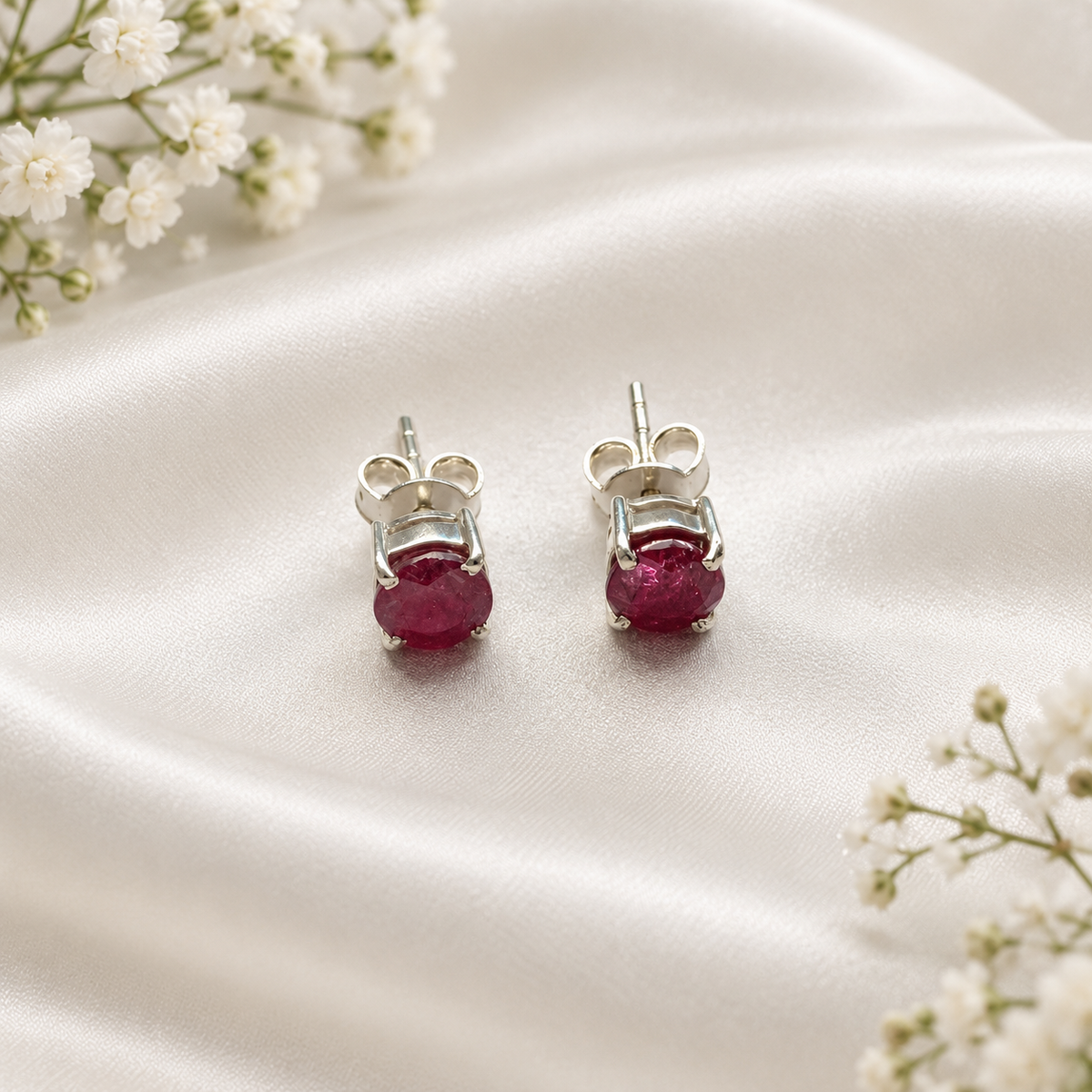 Ruby stud earrings in 925 sterling silver with red gemstone