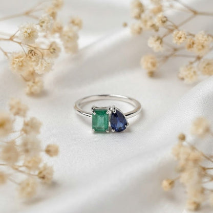Emerald and Sapphire Ring crafted in 925 Sterling Silver with green and blue gemstones.