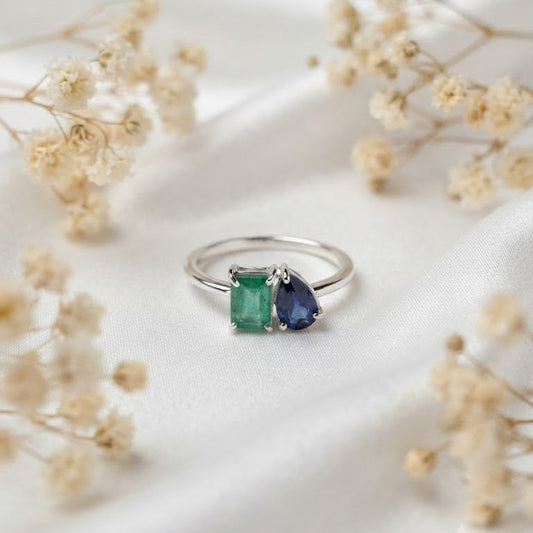 Emerald and Sapphire Ring crafted in 925 Sterling Silver with green and blue gemstones.