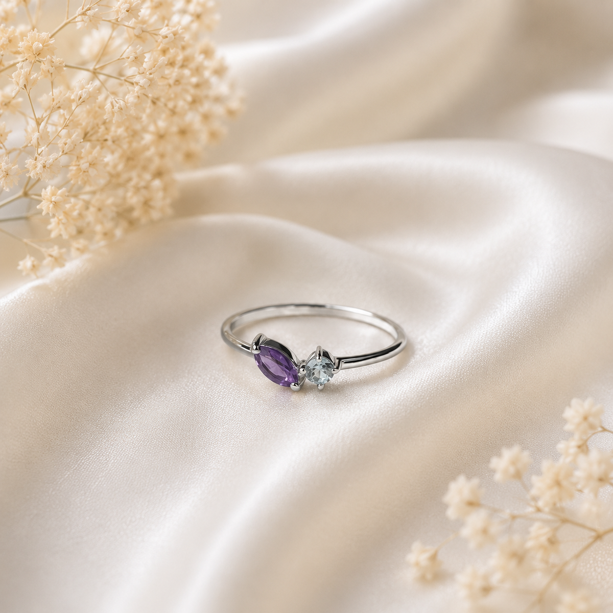 Twin Amethyst Ring in 925 Sterling Silver with a marquise purple gemstone and round white accent stone