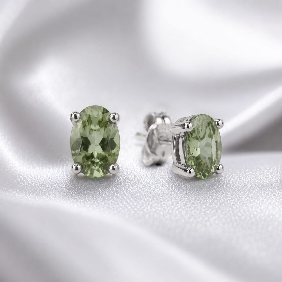 Green Tourmaline ear studs with light green cushion-cut gemstones in 925 Sterling Silver